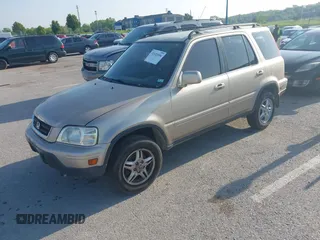 2000 Honda CR-V SE with VIN JHLRD1878YC048555, listed as a IAAI auction lot 42123556 with 164,934 mi miles. Bid and sale history available at carsss.com. Image 2.