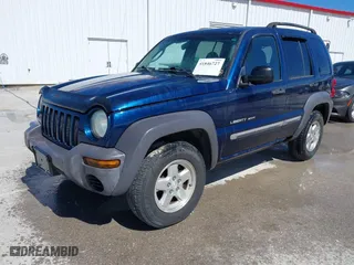 2003 Jeep Liberty Sport with VIN 1J4GL48K73W580572, listed as a IAAI auction lot 41846727 with 183,553 mi miles. Bid and sale history available at carsss.com. Image 2.