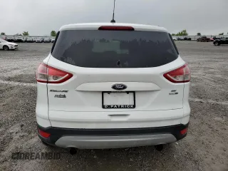 2013 Ford Escape SE with VIN 1FMCU9GX7DUA24721, listed as a Copart auction lot 54543385 with 203,036 mi miles and Salvage title. Bid and sale history available at DreamBid. Image 6.
