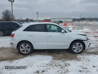 2017 Audi Q3 Premium Plus z VIN WA1JCCFS6HR008921, wystawiony jako IAAI lot #41351675 z przebiegiem 117 158 mil mil oraz . Historia ofert i sprzedaży dostępna na DreamBid. Obrazek 13.