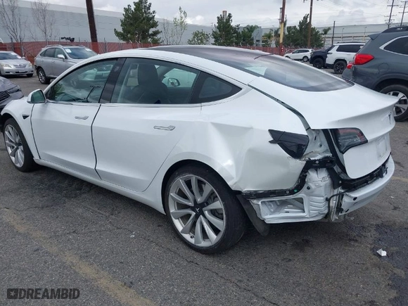 2018 Tesla Model 3 Long Range Battery with VIN 5YJ3E1EA6JF053052, listed as a IAAI auction lot 41765978 with 92,222 mi miles. Bid and sale history available at carsss.com. Image 3.