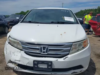 2012 Honda Odyssey LX z VIN 5FNRL5H28CB096385, wystawiony jako IAAI lot #42304664 z przebiegiem 105 010 mil mil oraz . Historia ofert i sprzedaży dostępna na DreamBid. Obrazek 12.