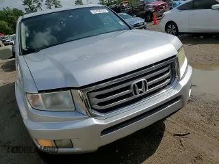 2014 Honda Ridgeline RTL with VIN 5FPYK1F58EB012869, listed as a Copart auction lot 51854995 with 318,950 mi miles and Salvage title. Bid and sale history available at DreamBid. Image 13.