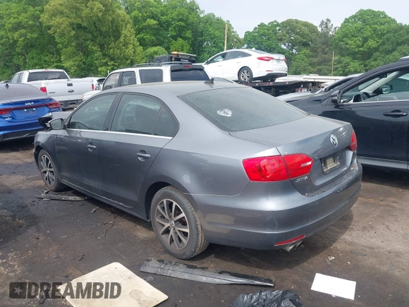 2014 Volkswagen Jetta SE z VIN 3VWD17AJ9EM298175, wystawiony jako IAAI lot #42084756 z przebiegiem 93 039 mil mil oraz . Historia ofert i sprzedaży dostępna na DreamBid. Obrazek 3.
