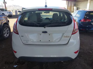 2014 Ford Fiesta SE with VIN 3FADP4EJ7EM111919, listed as a IAAI auction lot 42063116 with 154,137 mi miles and . Bid and sale history available at DreamBid. Image 16.