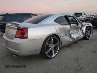 2006 Dodge Charger SRT-8 with VIN 2B3KA73W26H279925, listed as a Copart auction lot 78479574 with 127,443 mi miles and Salvage Title. Bid and sale history available at DreamBid. Image 3.