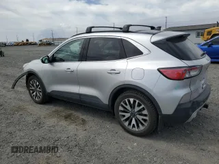 2020 Ford Escape Titanium with VIN 1FMCU9J99LUB07009, listed as a Copart auction lot 63213495 with 61,376 mi miles and Salvage title. Bid and sale history available at DreamBid. Image 2.