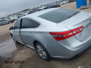 2013 Toyota Avalon XLE with VIN 4T1BK1EB4DU053880, listed as a IAAI auction lot 41605330 with 266,336 mi miles and . Bid and sale history available at DreamBid. Image 3.