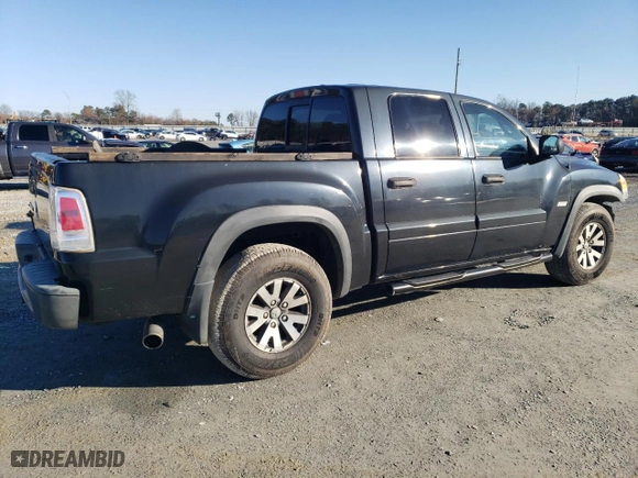 2006 Mitsubishi Raider Duro Cross with VIN 1Z7HC38N06S574644, listed as a Copart auction lot 83741974 with 194124 miles and Salvage Title. Bid and sale history available at carsss.com. Image 3.