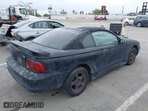 1998 Ford Mustang with VIN 1FAFP4042WF255177, listed as a IAAI auction lot 42421207 with 166,864 mi miles and . Bid and sale history available at DreamBid. Image 4.