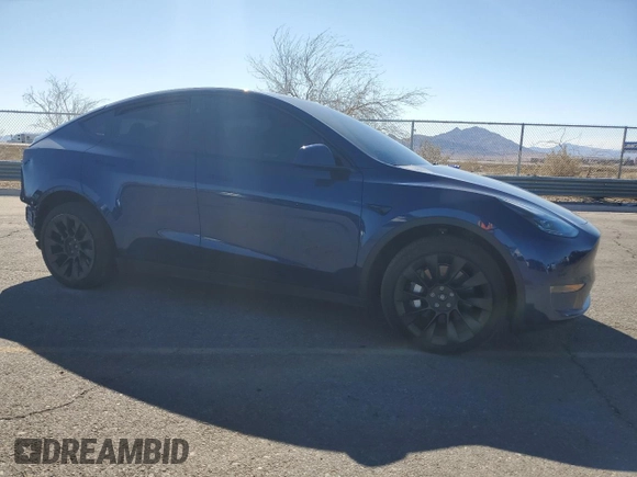 2023 Tesla Model Y Long Range z VIN 7SAYGDEE2PF908622, wystawiony jako Copart lot #47228145 z przebiegiem 10 639 mil mil oraz Szkoda całkowita • Salvage title. Historia ofert i sprzedaży dostępna na DreamBid. Obrazek 4.