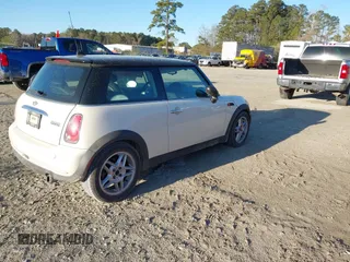 2006 MINI Hardtop with VIN WMWRC335X6TK16871, listed as a IAAI auction lot 41846929 with 145,709 mi miles and . Bid and sale history available at DreamBid. Image 4.