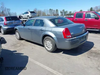 2006 Chrysler 300 with VIN 2C3KA43R06H218634, listed as a IAAI auction lot 41821366 with 150,313 mi miles. Bid and sale history available at carsss.com. Image 3.