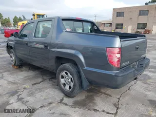 2011 Honda Ridgeline RT with VIN 5FPYK1F27BB453796, listed as a IAAI auction lot 41126251 with 122,746 mi miles. Bid and sale history available at carsss.com. Image 3.