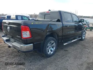 2019 Ram 1500 Big Horn/Lone Star with VIN 1C6SRFFT7KN781986, listed as a IAAI auction lot 41725219 with 62,351 mi miles. Bid and sale history available at carsss.com. Image 4.