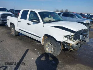 2005 Dodge Dakota SLT with VIN 1D7HW48N85S226460, listed as a IAAI auction lot 41568128 with 213,159 mi miles. Bid and sale history available at carsss.com. Image 1.