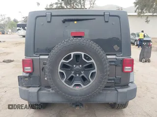 2014 Jeep Wrangler Unlimited Sport with VIN 1C4BJWDG7EL244749, listed as a IAAI auction lot 41871127 with 128,420 mi miles and . Bid and sale history available at DreamBid. Image 17.