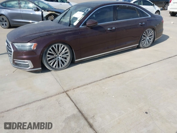 2019 Audi A8 z VIN WAU8DAF85KN004784, wystawiony jako IAAI lot #42414695 z przebiegiem Nie podano mil oraz . Historia ofert i sprzedaży dostępna na DreamBid. Obrazek 17.