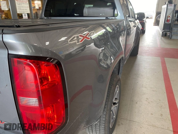 2021 Chevrolet Colorado 4WD Work Truck with VIN 1GCGTBEN0M1131662, listed as a IAAI auction lot 42788983 with 78,205 mi miles and . Bid and sale history available at DreamBid. Image 20.