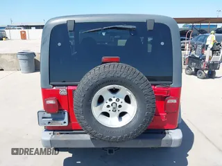 2001 Jeep Wrangler Sport with VIN 1J4FA49S11P375854, listed as a IAAI auction lot 42334037 with 215,027 mi miles and . Bid and sale history available at DreamBid. Image 16.
