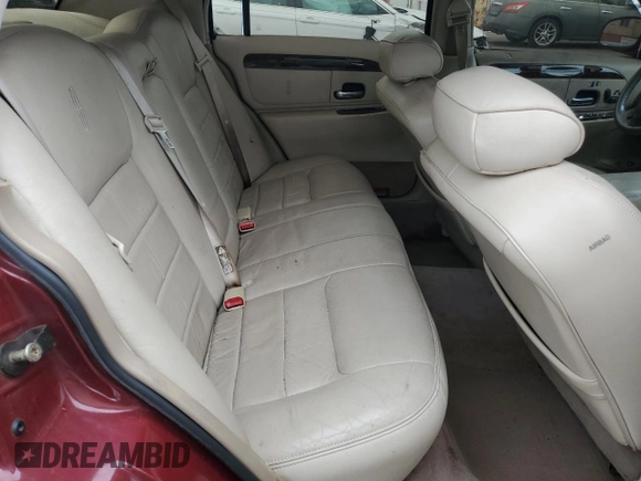 1999 Lincoln Town Car Executive z VIN 1LNHM81W5XY655075, wystawiony jako Copart lot #43263935 z przebiegiem Nie podano mil oraz Szkoda całkowita • Salvage title. Historia ofert i sprzedaży dostępna na DreamBid. Obrazek 10.
