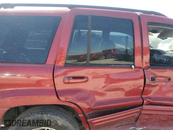 2002 Jeep Grand Cherokee Limited with VIN 1J4GX58N52C216106, listed as a Copart auction lot 50381665 with 280,774 mi miles and Salvage Title. Bid and sale history available at DreamBid. Image 11.