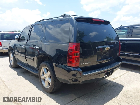 2011 Chevrolet Tahoe LT with VIN 1GNSCBE01BR389984, listed as a IAAI auction lot 42673033 with 289,294 mi miles and . Bid and sale history available at DreamBid. Image 3.