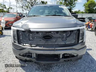 2024 Ford F-150 Lightning XLT with VIN 1FTVW3LK8RWG23783, listed as a Copart auction lot 58359625 with 5,864 mi miles and Salvage title. Bid and sale history available at DreamBid. Image 5.