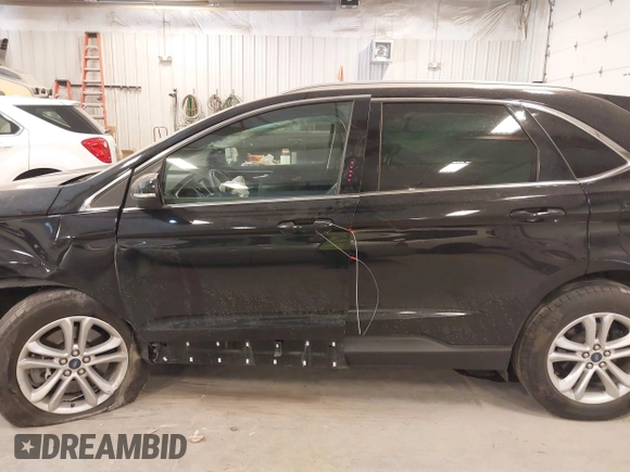 2020 Ford Edge SEL z VIN 2FMPK4J95LBA90533, wystawiony jako IAAI lot #42151916 z przebiegiem 57 197 mil mil oraz . Historia ofert i sprzedaży dostępna na DreamBid. Obrazek 14.