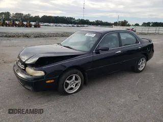1996 Mazda 626 z VIN 1YVGE22C2T5585359, wystawiony jako Copart lot #74568444 z przebiegiem 159 922 mil mil oraz Szkody całkowita. Historia ofert i sprzedaży dostępna na DreamBid. Obrazek 1.
