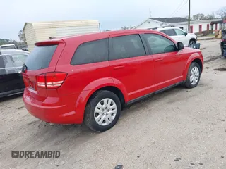 2013 Dodge Journey SE with VIN 3C4PDCAB5DT713666, listed as a IAAI auction lot 41666251 with 198,798 mi miles. Bid and sale history available at carsss.com. Image 4.