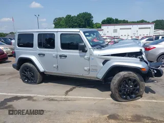 2024 Jeep Wrangler Sahara with VIN 1C4RJXP60RW292136, listed as a IAAI auction lot 42280063 with 26,701 mi miles and . Bid and sale history available at DreamBid. Image 13.