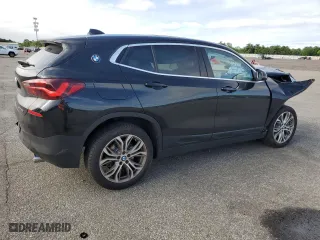 2021 BMW X2 xDrive28i with VIN WBXYJ1C06M5S80214, listed as a Copart auction lot 67921564 with 45,056 mi miles and Salvage Title. Bid and sale history available at carsss.com. Image 3.
