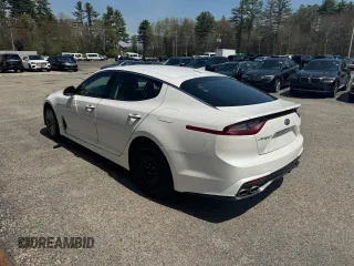 2018 Kia Stinger with VIN KNAE15LA7J6031245, listed as a Copart auction lot 55879285 with 144,020 mi miles and Clean Title. Bid and sale history available at carsss.com. Image 3.