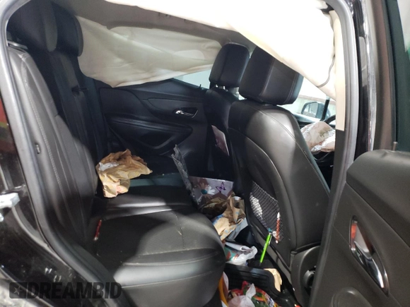 2018 Buick Encore Preferred with VIN KL4CJASB2JB665917, listed as a Copart auction lot 52952515 with 93,036 mi miles and Salvage Title. Bid and sale history available at DreamBid. Image 11.