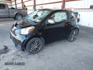 2012 Scion iQ with VIN JTNJJXB00CJ016247, listed as a IAAI auction lot 42117563 with 105,809 mi miles. Bid and sale history available at carsss.com. Image 2.