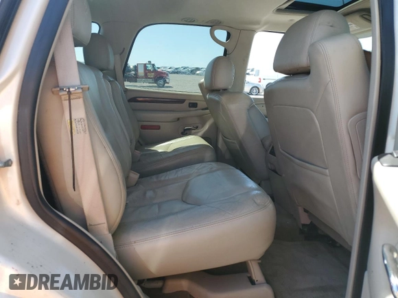 2005 Cadillac Escalade z VIN 1GYEK63N95R118426, wystawiony jako Copart lot #52681345 z przebiegiem 247 972 mil mil oraz Szkoda całkowita • Salvage title. Historia ofert i sprzedaży dostępna na DreamBid. Obrazek 11.