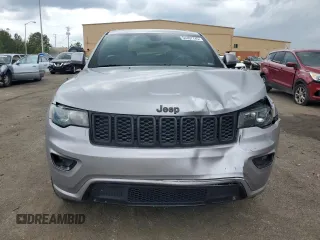 2018 Jeep Grand Cherokee Altitude with VIN 1C4RJEAG9JC246753, listed as a Copart auction lot 54497745 with 121,665 mi miles and Salvage title. Bid and sale history available at DreamBid. Image 5.