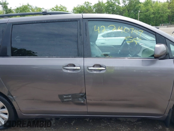 2015 Toyota Sienna Limited with VIN 5TDDK3DC6FS111675, listed as a IAAI auction lot 42240747 with 124,967 mi miles and . Bid and sale history available at DreamBid. Image 13.