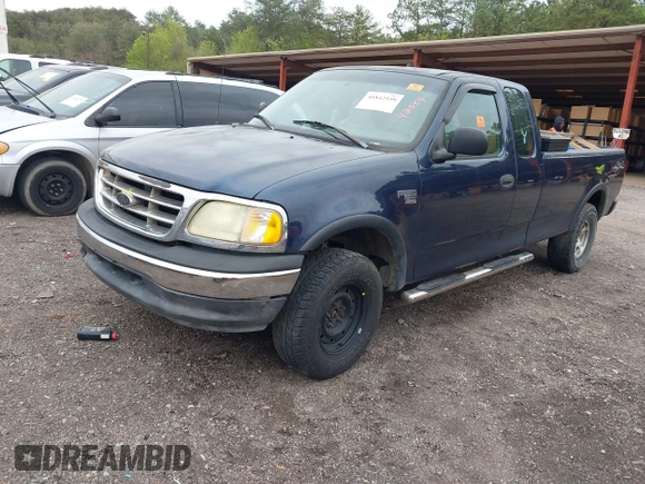 2003 Ford F-150 XL with VIN 1FTRX18L63NB59927, listed as a IAAI auction lot 41842559 with 1 mi miles. Bid and sale history available at carsss.com. Image 2.