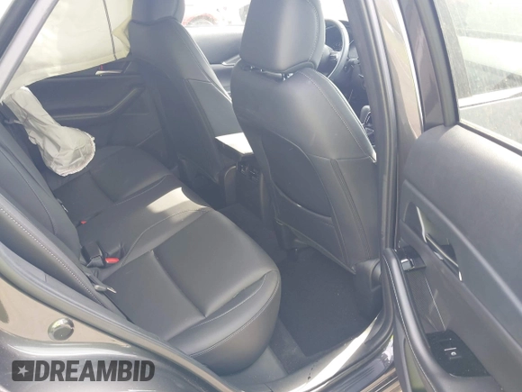 2024 Mazda CX-30 S Carbon Edition with VIN 3MVDMBCM5RM665341, listed as a IAAI auction lot 42180459 with 4,496 mi miles and . Bid and sale history available at DreamBid. Image 8.