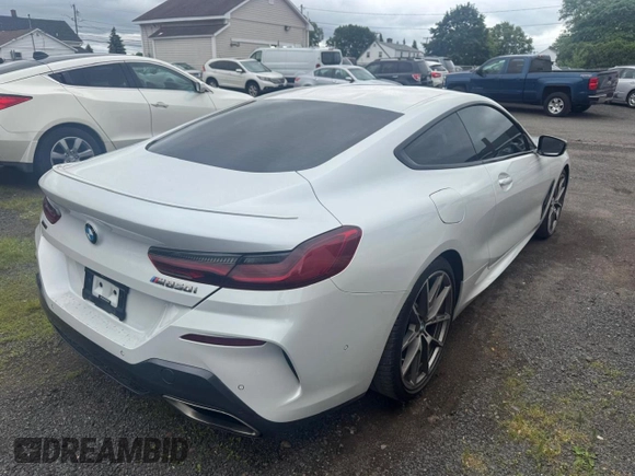 2019 BMW 8 Series M850i xDrive z VIN WBABC4C57KBJ35771, wystawiony jako Copart lot #59172615 z przebiegiem 68 270 mil mil oraz Tytuł czysty. Historia ofert i sprzedaży dostępna na DreamBid. Obrazek 3.