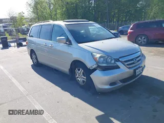 2006 Honda Odyssey EX-L with VIN 5FNRL38736B016026, listed as a IAAI auction lot 41971496 with 302,046 mi miles. Bid and sale history available at carsss.com. Image 1.
