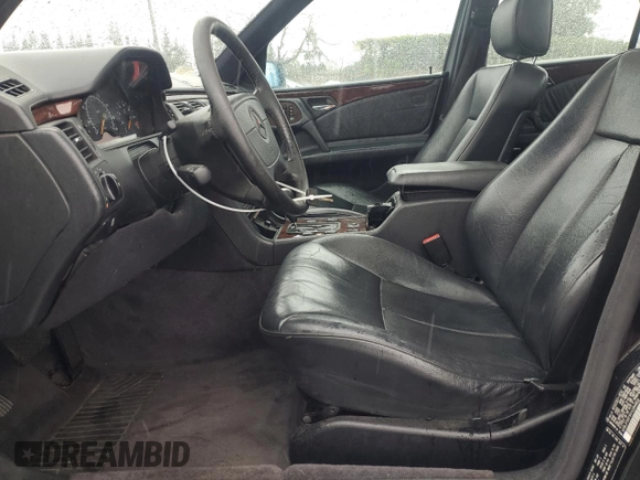 1997 Mercedes-Benz E-Class with VIN WDBJF55F9VA294656, listed as a Copart auction lot 49136745 with 0 mi miles and Salvage Title. Bid and sale history available at carsss.com. Image 7.