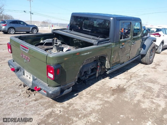 2022 Jeep Gladiator Rubicon with VIN 1C6JJTBG9NL102133, listed as a IAAI auction lot 41547187 with 105,881 mi miles. Bid and sale history available at carsss.com. Image 4.