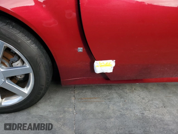 2007 Cadillac XLR z VIN 1G6YV36A575601135, wystawiony jako Copart lot #75123444 z przebiegiem Nie podano mil oraz Szkody całkowita. Historia ofert i sprzedaży dostępna na DreamBid. Obrazek 12.
