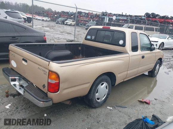 1999 Toyota Tacoma with VIN 4TAVL52N4XZ524059, listed as a IAAI auction lot 41761806 with 214,425 mi miles and . Bid and sale history available at DreamBid. Image 4.