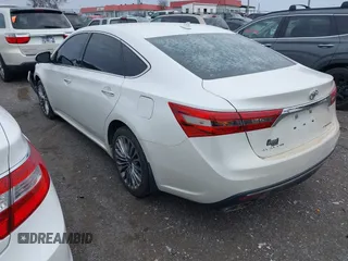 2016 Toyota Avalon Limited with VIN 4T1BK1EB6GU201211, listed as a IAAI auction lot 41599051 with 211,533 mi miles and . Bid and sale history available at carsss.com. Image 3.