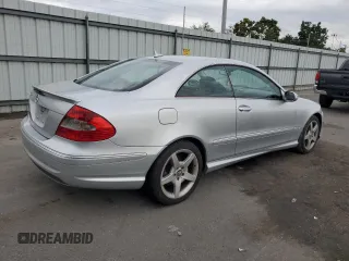 2007 Mercedes-Benz CLK 550 with VIN WDBTJ72H97F214917, listed as a Copart auction lot 73154374 with 110,017 mi miles and Salvage Title. Bid and sale history available at DreamBid. Image 3.