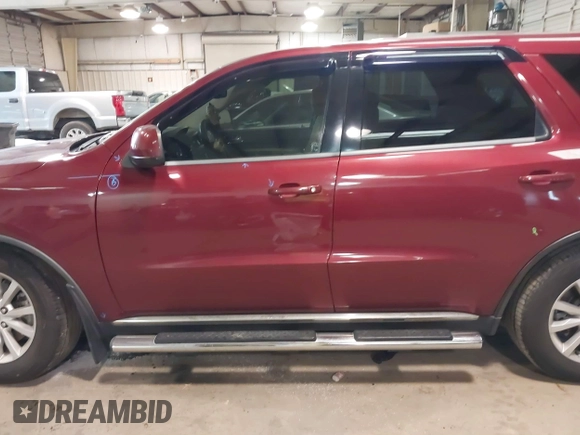 2014 Dodge Durango SXT with VIN 1C4RDHAG2EC344327, listed as a IAAI auction lot 41506093 with 142,264 mi miles and . Bid and sale history available at carsss.com. Image 14.